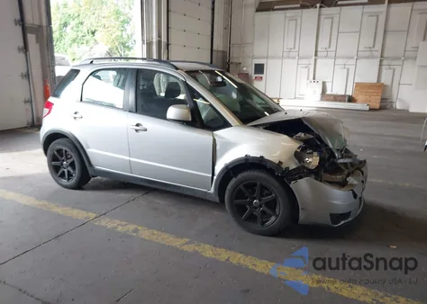 2010 Suzuki Sx4 Technology z USA, uszkodzony, nr VIN JS2YB5A39A6302670